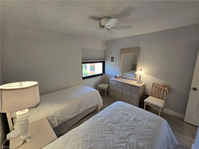 Super Second Bedroom with 2 Beds, Lamps, Ceiling Fan, Closet and Window for Natural Light!