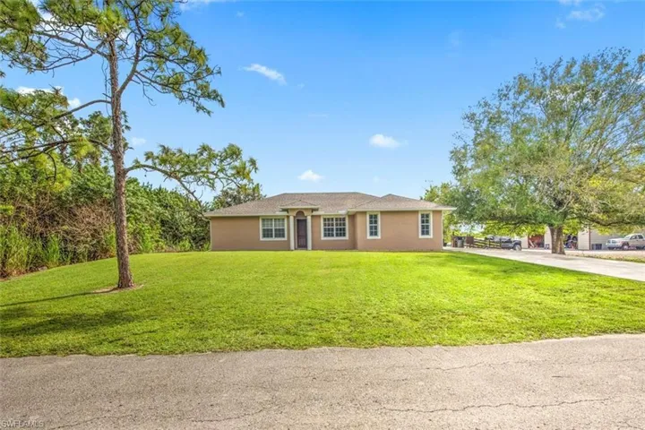View of front of home with a front yard