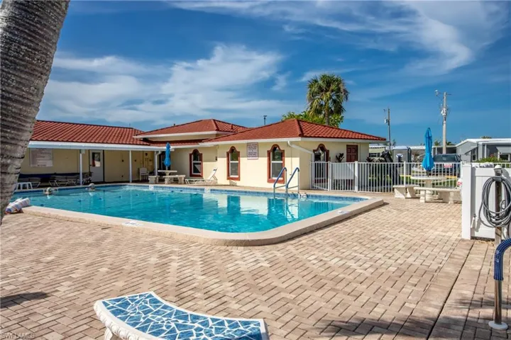 View of swimming pool with a patio