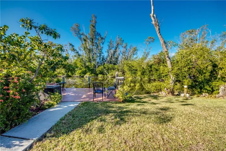 View of yard with a deck