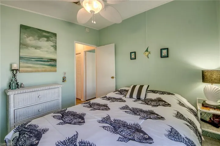 Bedroom with a closet and ceiling fan