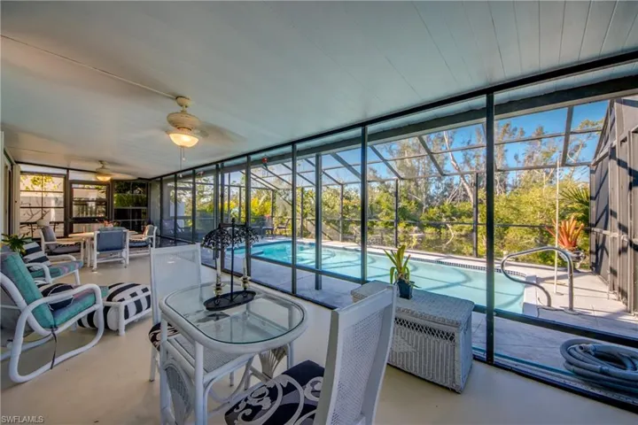 Sunroom with ceiling fan