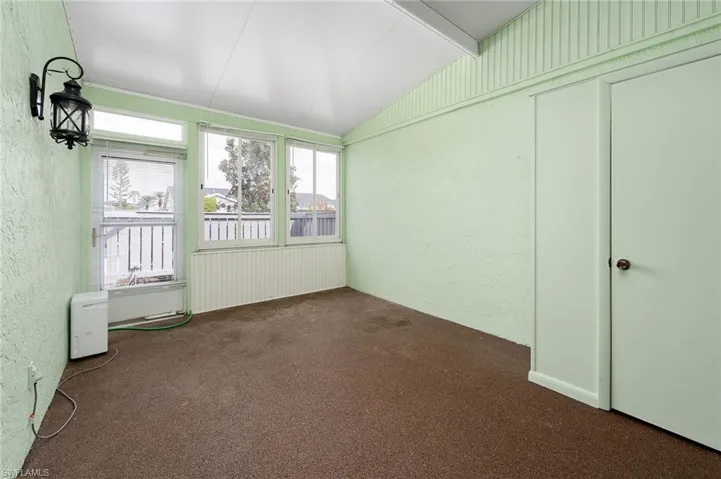Enclosed Lanai Offers Additional Living Space!