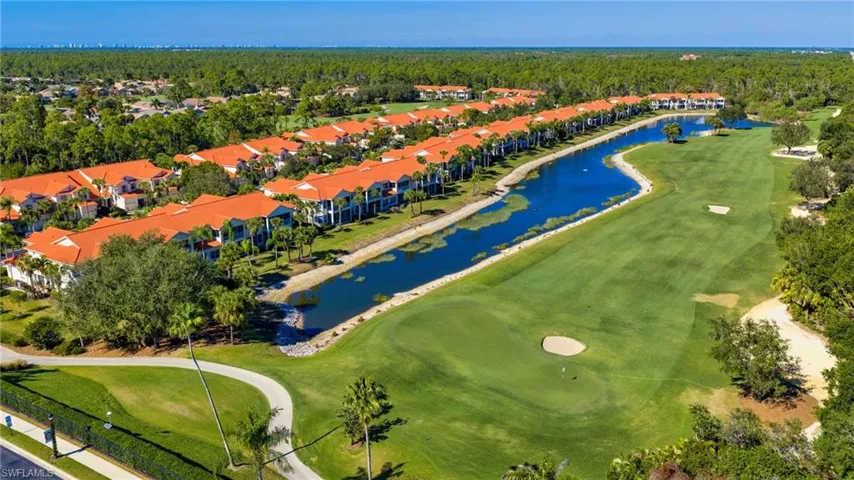 Aerial view of a local golf course and a large body of water