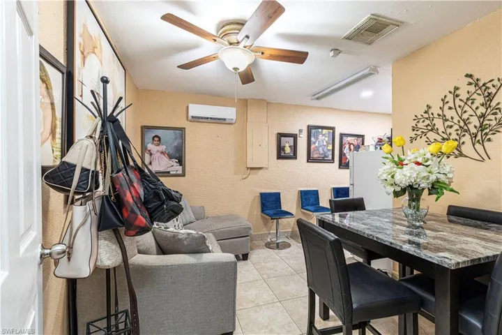 efficiency space with dining table and kitchen + A/C mini split