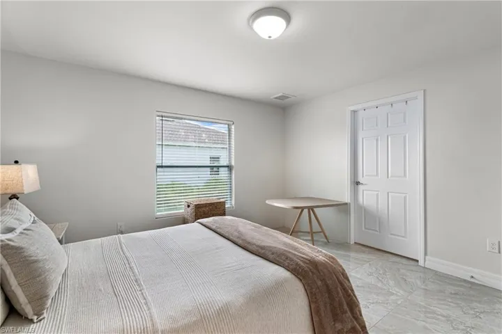 Bedroom featuring baseboards
