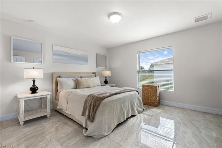 Bedroom featuring baseboards
