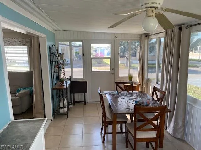 Sunroom with tile patterned floors