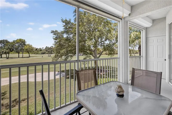 Screened lanai offering expansive golf course views