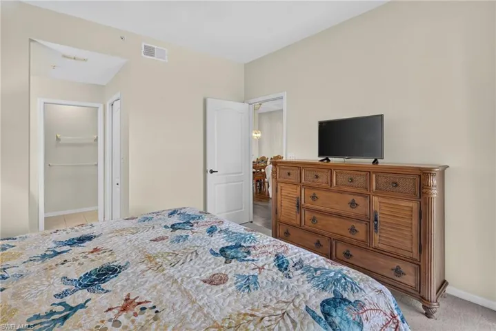 Neutral tone walls with recessed lighting