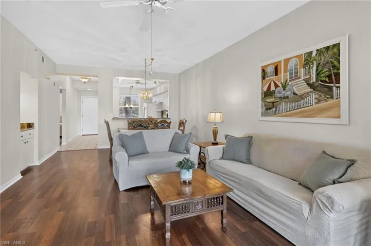 Living area featuring wood-finish flooring and light wall tones