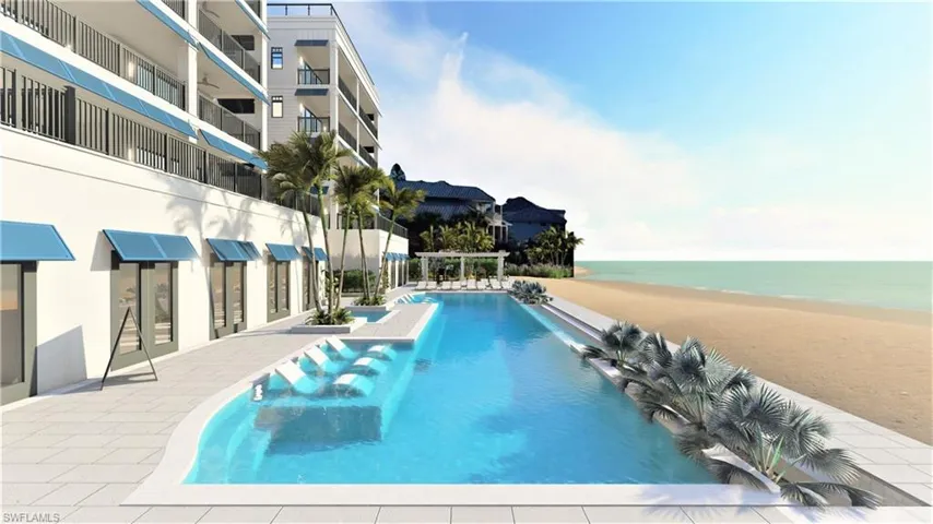 View of pool featuring a patio area, a water view, and a beach view