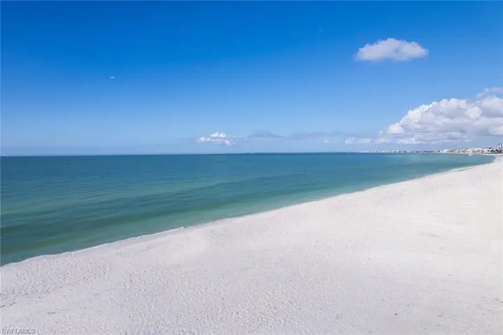 Property view of water featuring a beach view