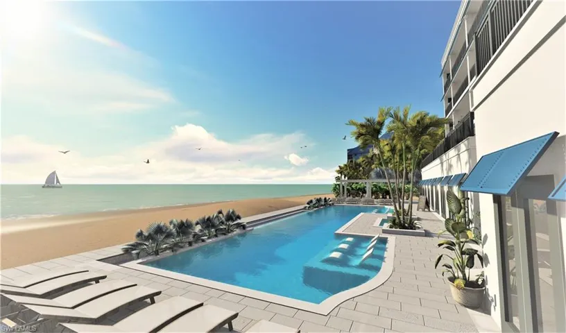 View of swimming pool featuring a patio area, a water view, and a view of the beach