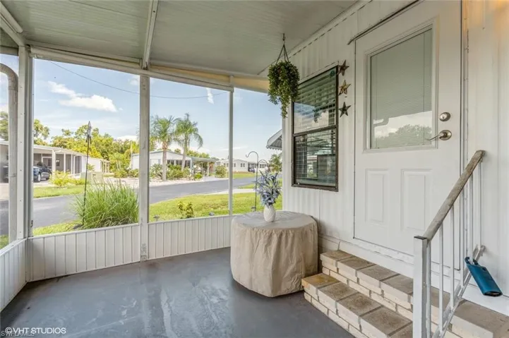 Sunroom with a residential view