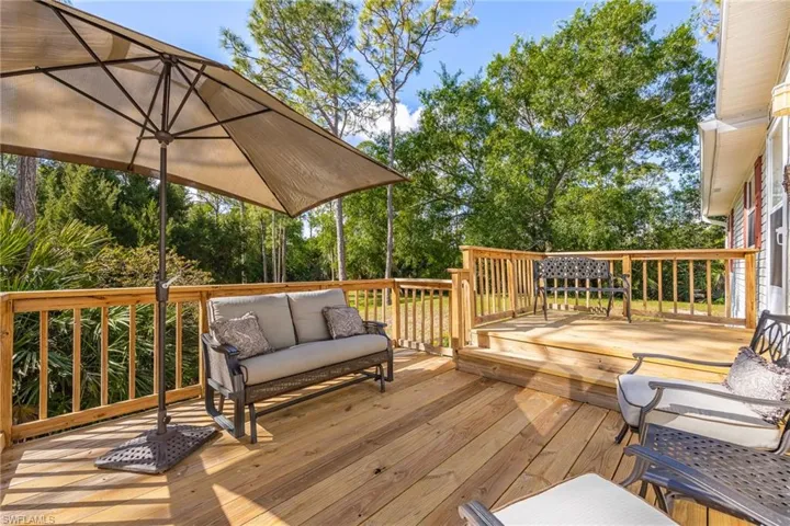 Deck with an outdoor living space