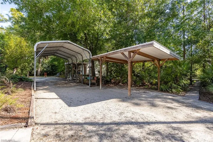 View of community featuring a carport
