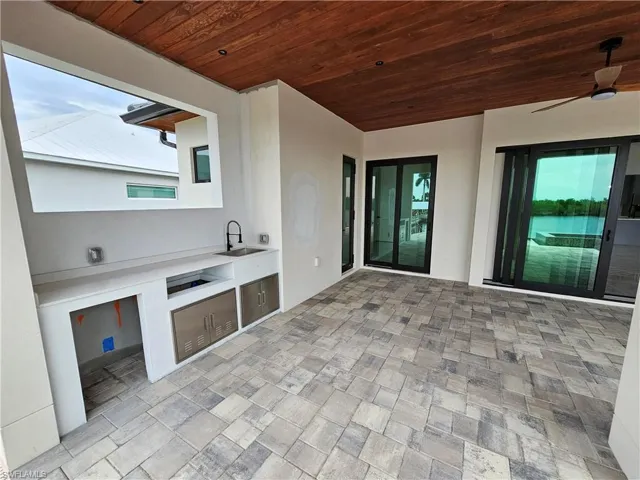Outdoor kitchen will get a built-in stainless steel grill and refrigerator