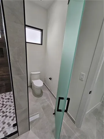 Comode at master bathroom
