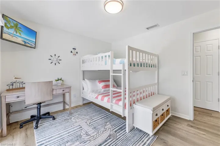 Bedroom with light wood-type flooring