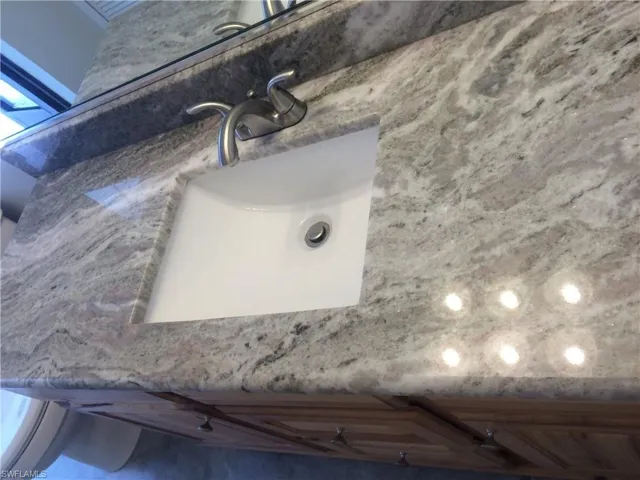 Bathroom view of vanity and toilet