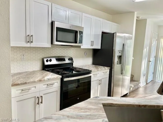 Kitchen with stainless steel appliances