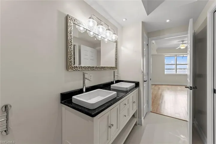 All new and upgraded vanity, counter top with dual sinks and lighting/mirror