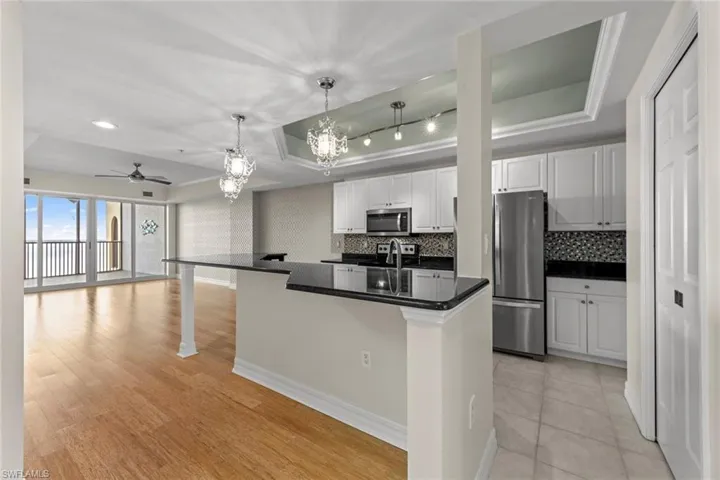 Beautiful remodeled kitchen with granite countertops and stainless appliances and pantry