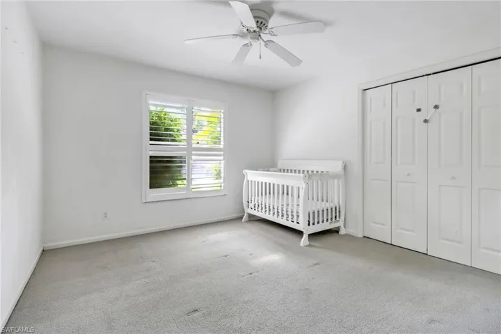 Unfurnished guest bedroom with carpet