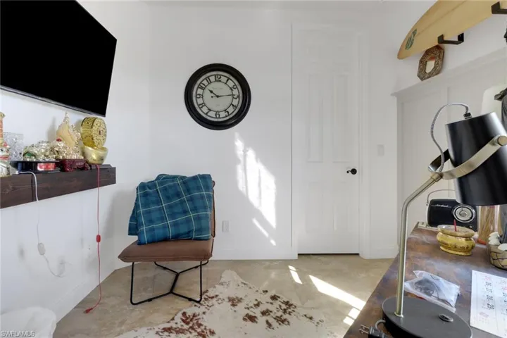 Foyer entrance featuring light carpet