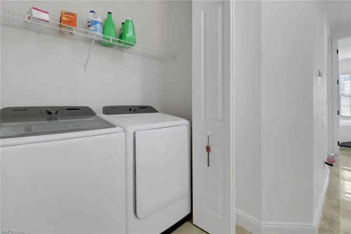 Laundry room with separate washer and dryer