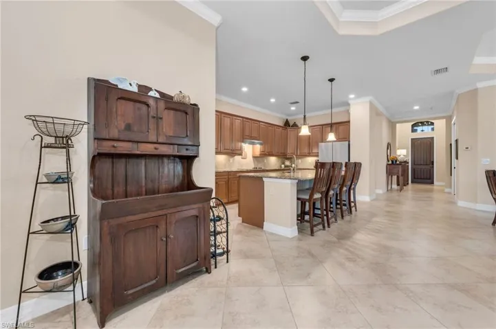 Long view of Kitchen and Foyer