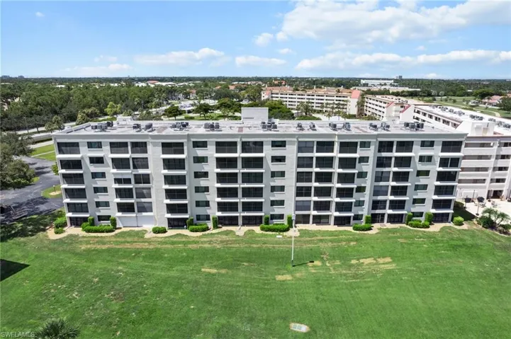 Drone / aerial view of apartment complex / building