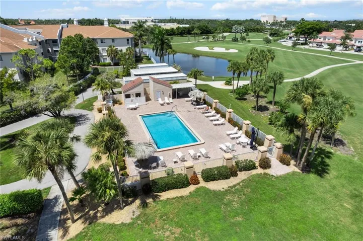 Aerial view of a nearby body of water and a local golf course