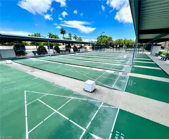 View of home's community featuring shuffleboard