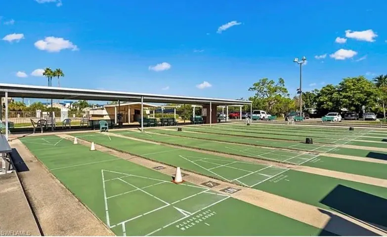 View of community featuring shuffleboard
