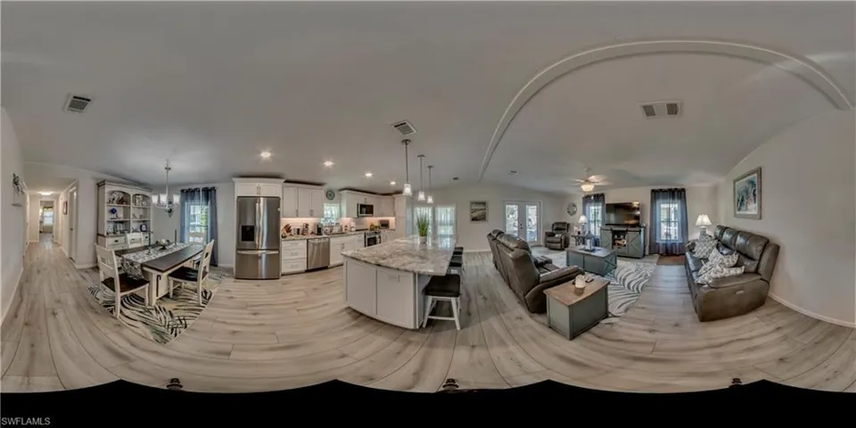 Living area with light wood-type flooring, french doors, crown molding, and ceiling fan