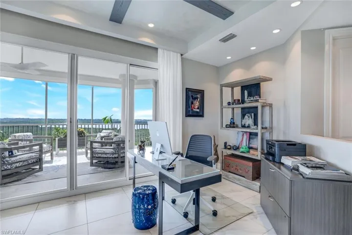 Office area featuring ceiling fan