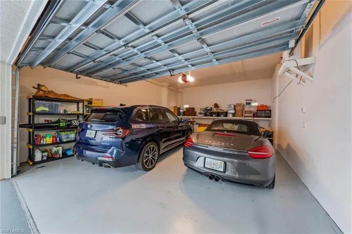 Garage featuring a garage door opener
