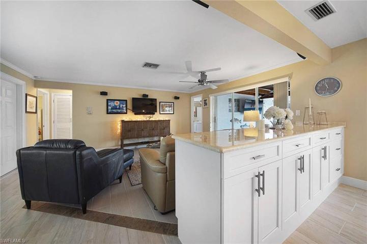 Long kitchen island great for entertaining .