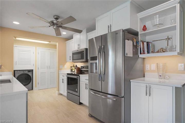 French door stainless refrigerator Maytag 2012. Garage whirlpool fridge 2023.
