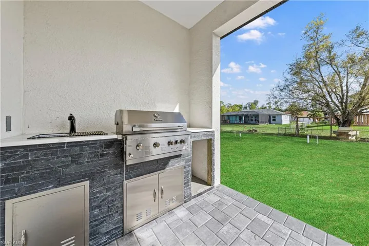 View of patio / terrace with an outdoor kitchen