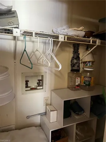 Laundry room with hookup for a washing machine
