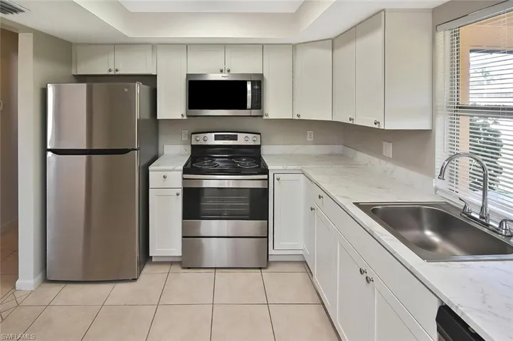 Kitchen with newer cabinets and appliances