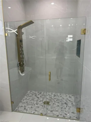 Bathroom with an enclosed shower
