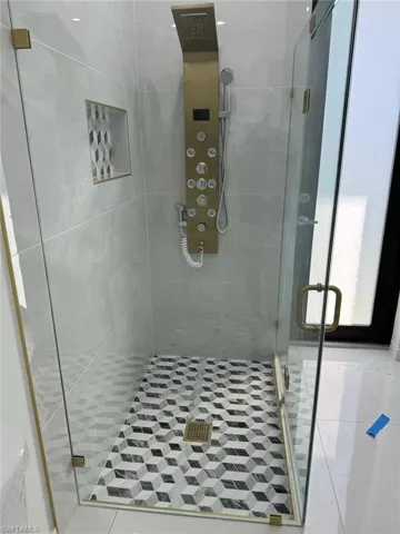 Bathroom featuring an enclosed shower