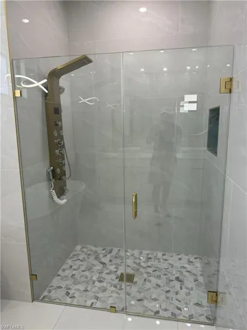 Bathroom with an enclosed shower