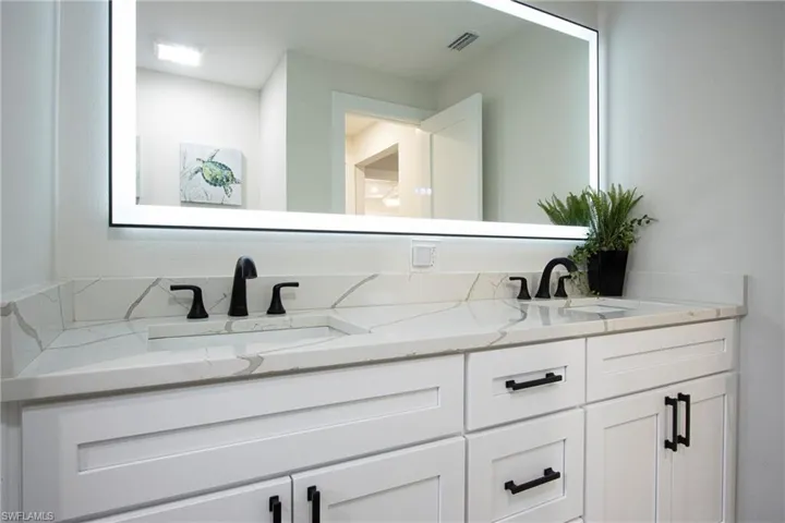 Bathroom featuring vanity