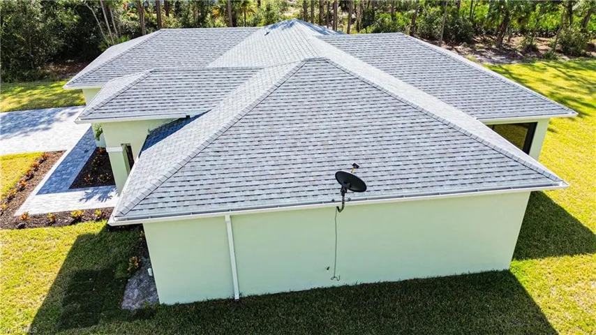 North side of house with satellite dish