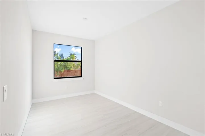 Empty room with baseboards